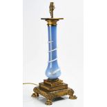 A FRENCH ORMOLU AND BLUE OPALINE GLASS MOUNTED TABLE LAMP