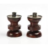 A PAIR OF EDWARDIAN SILVER MOUNTED YEW WOOD CANDLESTICKS