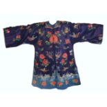 A CHINESE EMBRIODERED BLUE GROUND SILK ROBE