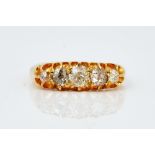 A VICTORIAN 18CT GOLD AND DIAMOND SET FIVE STONE RING