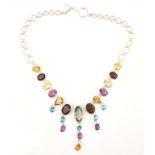 A SILVER AND VARICOLOURED GEMSTONE NECKLACE