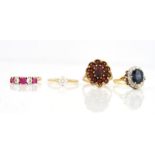 AN 18CT GOLD, SAPPHIRE AND DIAMOND OVAL CLUSTER RING AND THREE FURTHER GOLD AND GEM SET RINGS