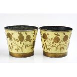 A PAIR OF CREAM PAINTED AND GILT DECORATED TOLE PEINTE JARDINIERES