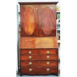 A GEORGE III MAHOGANY BUREAU BOOKCASE