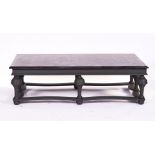 A LARGE RECTANGULAR MARBLE TOPPED COFFEE TABLE