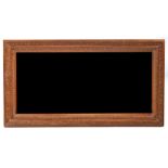 A 19TH CENTURY OAK FRAMED RECTANGULAR MIRROR