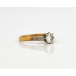 A GOLD AND PLATINUM, DIAMOND SINGLE STONE RING