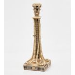 AN EUROPEAN IVORY MOUNTED CANDLESTICK