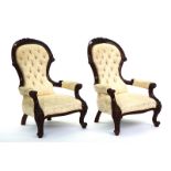 A PAIR OF HARDWOOD FRAMED OPEN ARMCHAIRS