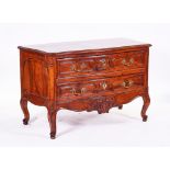 AN 18TH CENTURY FRENCH WALNUT SERPENTINE COMMODE