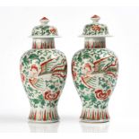A PAIR OF CHINESE PORCELAIN BALUSTER VASES AND COVERS