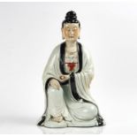 A LARGE CHINESE PORCELAIN FIGURE OF GUANYIN