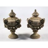A PAIR OF RECONSTITUTED STONE URN FINIALS
