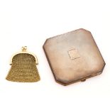 A GOLD CHAIN MESH COIN PURSE AND A LADY'S SILVER POWDER COMPACT (2)