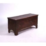 A 17TH CENTURY ELM PLANK COFFER