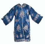 A CHINESE EMBROIDERED BLUE GROUND SILK ROBE