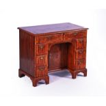 A MID 18TH CENTURY WALNUT KNEEHOLE WRITING DESK