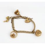 A 9CT GOLD TWIN CURB LINK CHARM BRACELET