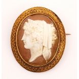A VICTORIAN GOLD MOUNTED OVAL SHELL CAMEO BROOCH