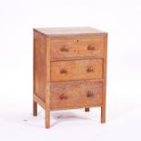 HEAL’S; A LIMED OAK THREE DRAWER CHEST
