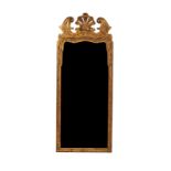 A GEORGE II STYLE GILT FRAMED WALL MIRROR