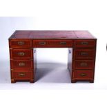 A MAHOGANY BRASS BOUND CAMPAIGN STYLE PEDESTAL DESK