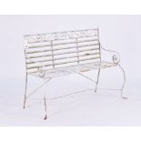 A WHITE PAINTED REGENCY STYLE WROUGHT IRON GARDEN BENCH