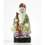A CHINESE FAMILLE ROSE FIGURE OF SHOULAO