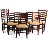 A MATCHED SET OF EIGHT LANCASHIRE LADDER BACK DINING CHAIRS