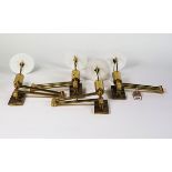 A SET OF FOUR LACQUERED BRASS ‘BILLY BALDWIN’ SWING-ARM WALL LIGHTS (4)