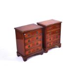 A PAIR OF MAHOGANY THREE DRAWER BEDSIDE CHESTS