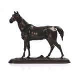 A PATINATED BRONZE MODEL OF A HORSE