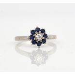 AN 18CT WHITE GOLD, SAPPHIRE AND DIAMOND CLUSTER RING