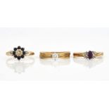 THREE 9CT GOLD AND GEM SET RINGS (3)