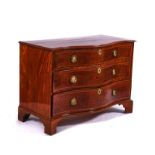 A GEORGE III INLAID MAHOGANY SERPENTINE CHEST