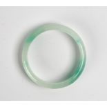 A TREATED JADE BANGLE