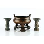 A CHINESE BRONZE TRIPOD CENSER AND STAND