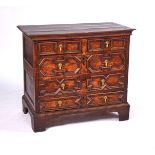 A CHARLES II OAK CHEST