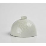 A CHINESE WHITE GLAZED PORCELAIN BEEHIVE WATER POT