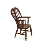 AN EARLY 20TH CENTURY CHILD’S ASH AND ELM WINDSOR CHAIR