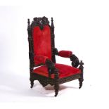 A 19TH CENTURY CONTINENTAL EXTENSIVELY CARVED GOTHIC REVIVAL OPEN ARMCHAIR