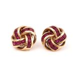 A PAIR OF GOLD AND RUBY EARSTUDS