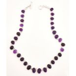 A SILVER AND AMETHYST NECKLACE