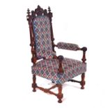 A 19TH CENTURY CARVED ROSEWOOD OPEN ARMCHAIR