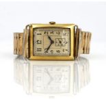 AN 18CT GOLD RECTANGULAR CASED GENTLEMAN'S WRISTWATCH