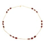 A GOLD AND GARNET NECKLACE