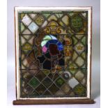 A COMMEMORATIVE STAINED AND LEADED GLASS WINDOW PANEL
