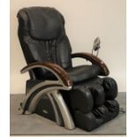 “Casada” A modern leather upholstered massage chair.