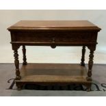 A Victorian oak single drawer side table