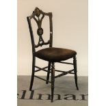 A Victorian style black lacquer and parcel gilt decorated side chair